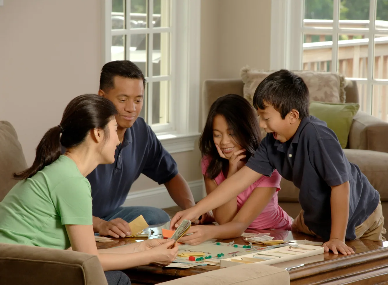 A family learning together around a table at home